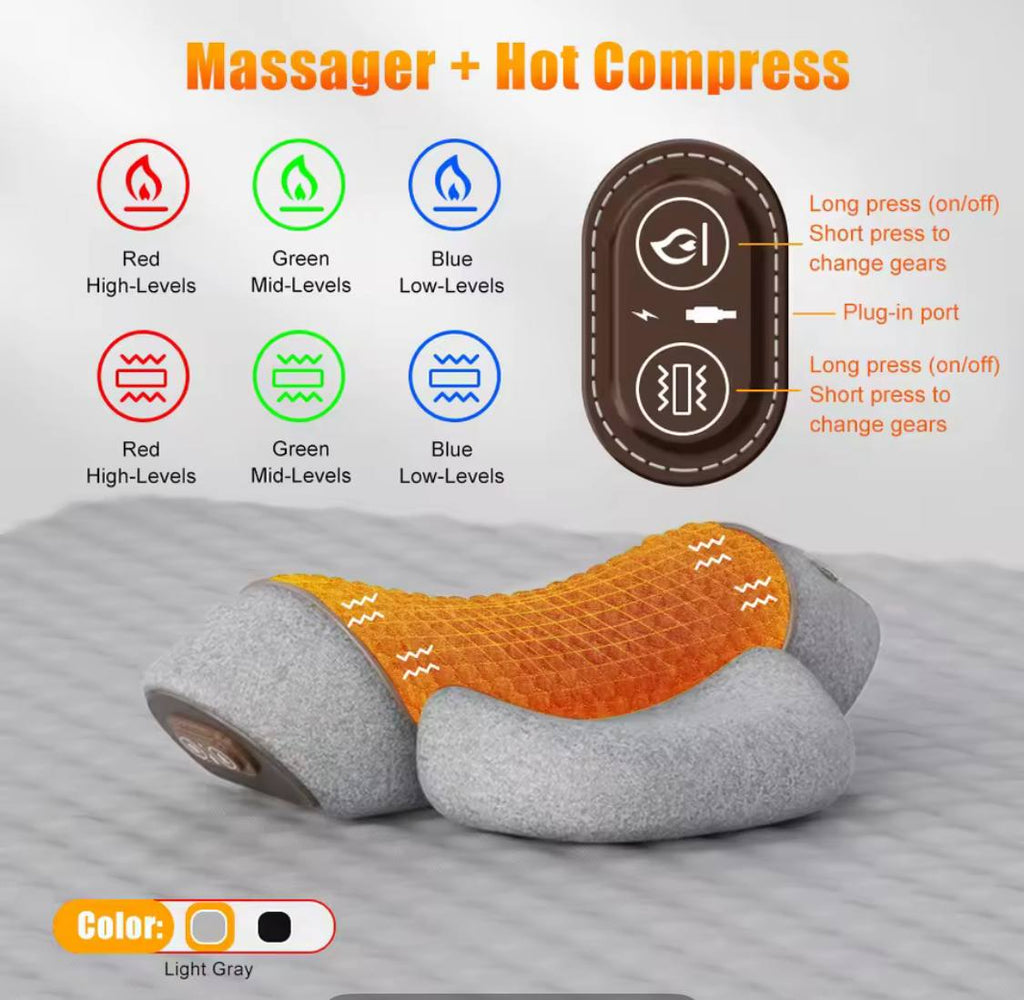 Massage pillow with control panel and color indicator on a bed